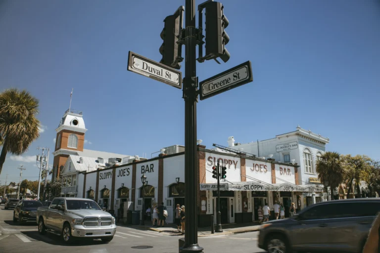 Traffic and pedestrians at Sloppy Joe's Bar, Key West, Duval Street.