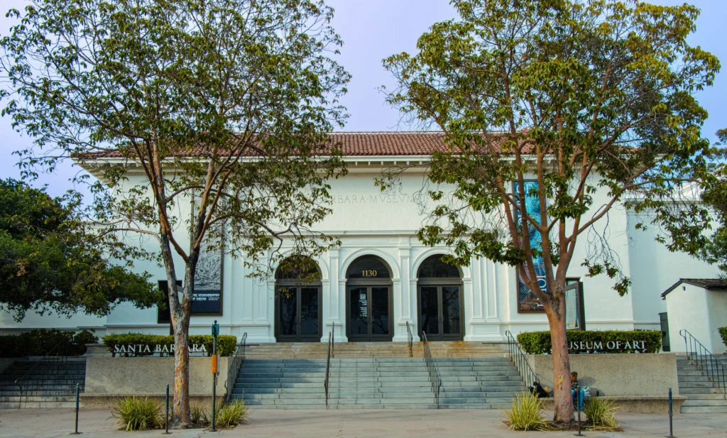 Front view of Santa Barbara Museum of Art with trees framing the entrance.