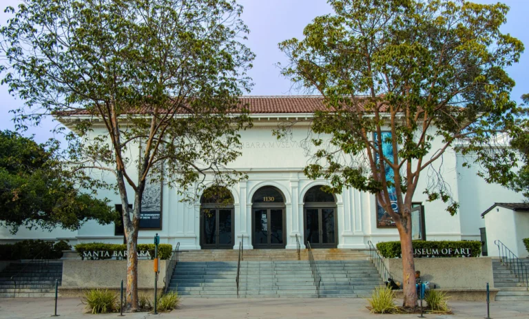Front view of Santa Barbara Museum of Art with trees framing the entrance.