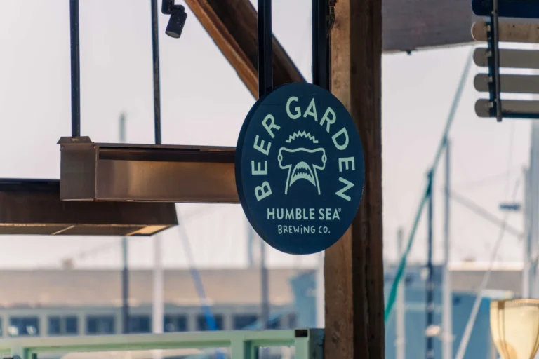 Outdoor view of Humble Sea Brewing Co beer garden sign in San Francisco marina area.