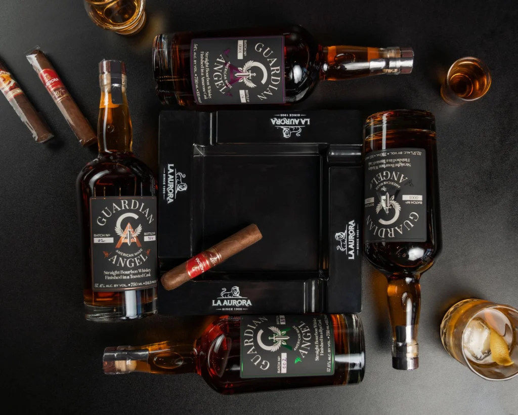 A captivating flat lay of Guardian Angel bourbon bottles and cigars in New Orleans bar ambiance.