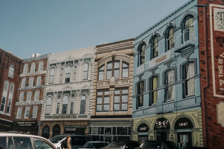 Colorful vintage-style building murals in Christchurch, New Zealand, capturing urban charm.